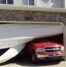 car hit garage door in San Antonio